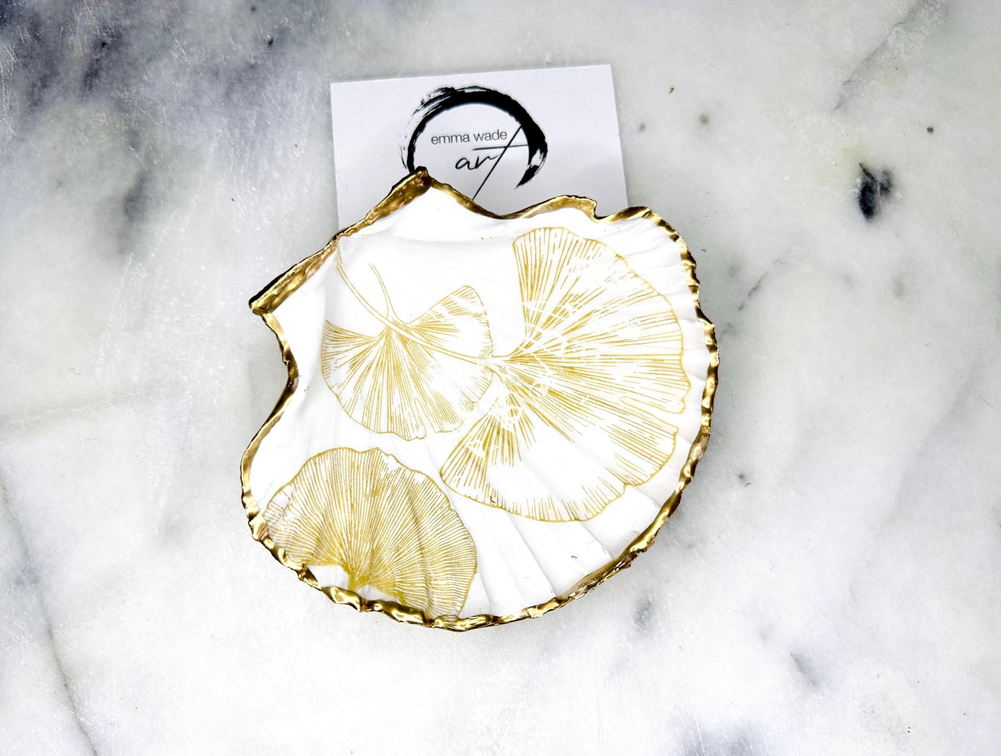 Scallop Hell Dish hand crafted with gold and white Gingko Designs, shellfish jewellery dish, UK Natural Scallop trinket tray, shell scallop dish, trinket tray shell, scallop shell jewellery bowl, golden trinket dish, decoupaged earring dish, scallop dish with gingko, decoupage shell dish, Emma Wade art, bride scallop dish, scallop shell trinket bowl, shell key bowl, gold gilded shell gift, coastal shell gift, gold white host gift, gold shell ornament, decoupage shell ring dish