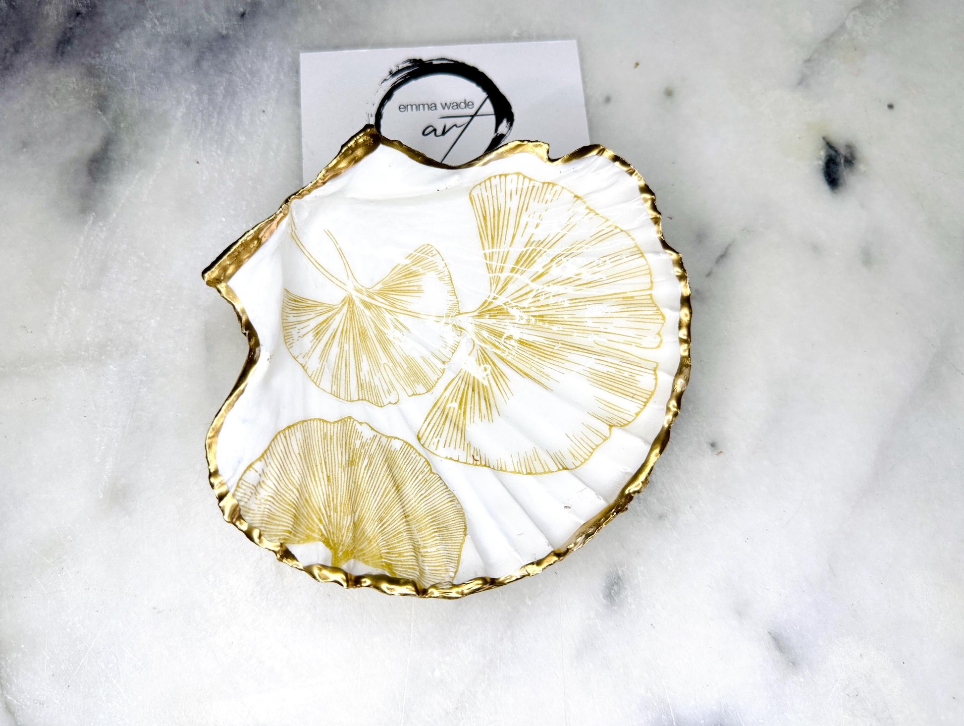 Scallop Hell Dish hand crafted with gold and white Gingko Designs, shellfish jewellery dish, UK Natural Scallop trinket tray, shell scallop dish, trinket tray shell, scallop shell jewellery bowl, golden trinket dish, decoupaged earring dish, scallop dish with gingko, decoupage shell dish, Emma Wade art, bride scallop dish, scallop shell trinket bowl, shell key bowl, gold gilded shell gift, coastal shell gift, gold white host gift, gold shell ornament, decoupage shell ring dish