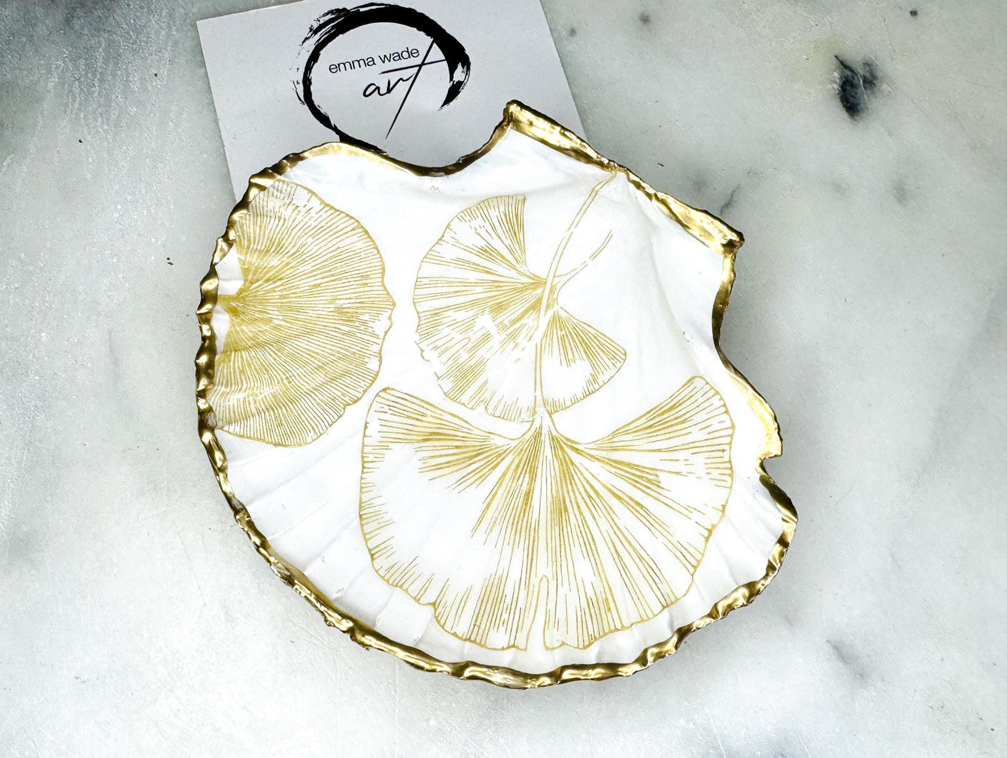 Scallop Hell Dish hand crafted with gold and white Gingko Designs, shellfish jewellery dish, UK Natural Scallop trinket tray, shell scallop dish, trinket tray shell, scallop shell jewellery bowl, golden trinket dish, decoupaged earring dish, scallop dish with gingko, decoupage shell dish, Emma Wade art, bride scallop dish, scallop shell trinket bowl, shell key bowl, gold gilded shell gift, coastal shell gift, gold white host gift, gold shell ornament, decoupage shell ring dish