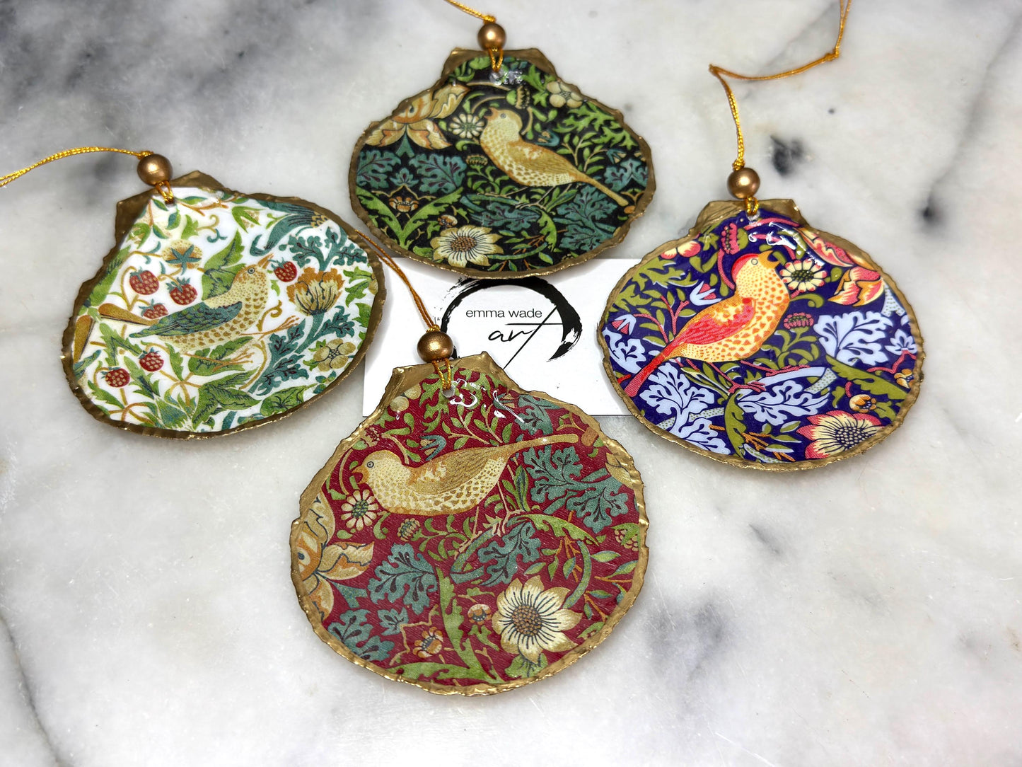 William Morris Strawberry Thief scallop shell ornaments, handmade Dorset scallop shell hanging decorations, gold leaf gilded flat shell ornaments, coastal Christmas tree decorations, Strawberry Thief William Morris nature inspired shell art, oyster and scallop shell hanging gifts, eco friendly handmade scallop shell decor UK, unique William Morris scallop ornaments for weddings, anniversaries, or new home, handmade Dorset scallop shell ornaments with gold string and gift box packaging