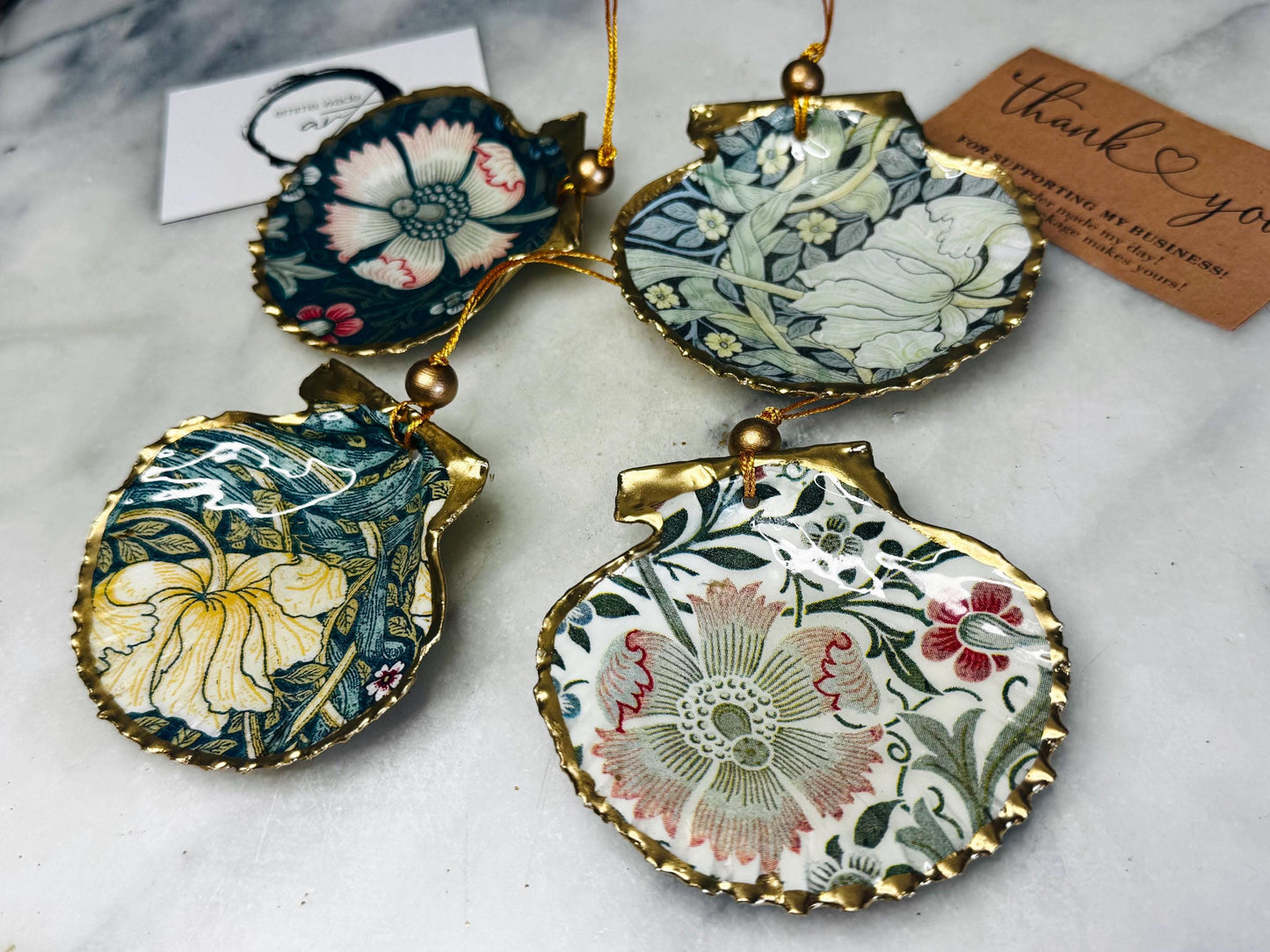 William Morris scallop shell ornaments sold individually or as set of 4, handmade Dorset shells with gold leaf gilded rims and backs, glossy resin interiors, Compton and Pimpernel floral designs, coastal hanging decorations with gold string, sustainable handmade gift, coastal home decor, Christmas ornament or unique shell gift