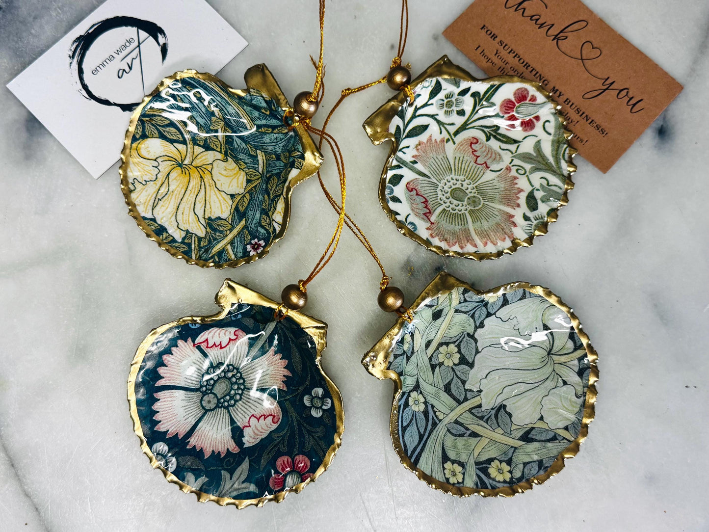 William Morris scallop shell ornaments sold individually or as set of 4, handmade Dorset shells with gold leaf gilded rims and backs, glossy resin interiors, Compton and Pimpernel floral designs, coastal hanging decorations with gold string, sustainable handmade gift, coastal home decor, Christmas ornament or unique shell gift