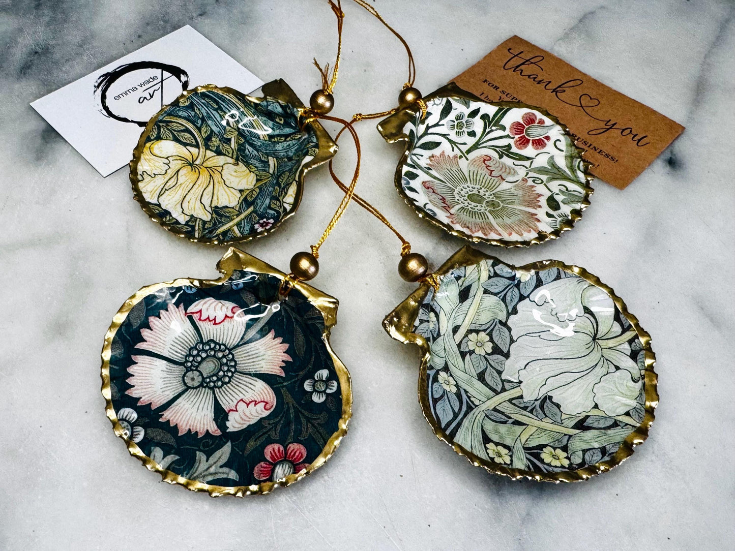 William Morris scallop shell ornaments sold individually or as set of 4, handmade Dorset shells with gold leaf gilded rims and backs, glossy resin interiors, Compton and Pimpernel floral designs, coastal hanging decorations with gold string, sustainable handmade gift, coastal home decor, Christmas ornament or unique shell gift
