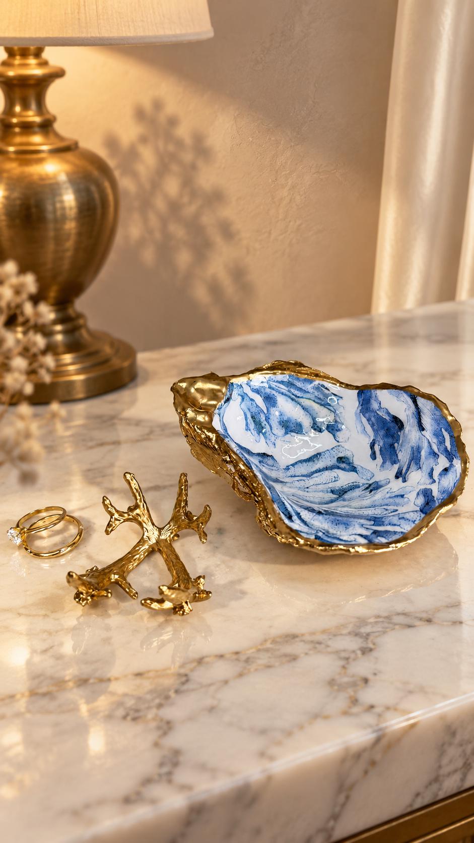 Trinket dishes gold finish, shell jewellery dish, navy and gold trinket tray, shell scallop dish, trinket tray shell, she dreams of the sea, shell jewellery bowl, golden trinket dish, oyster shell blue seaweed, blue and gold dishes, decoupaged earring dish, oyster dish with coral, shell art trinket, decoupage shell dish, Emma Wade art, bride oyster dish, oyster shell trinket, shell key bowl, shell coral dish